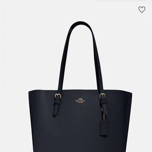 Coach Mollie tote with red inside color